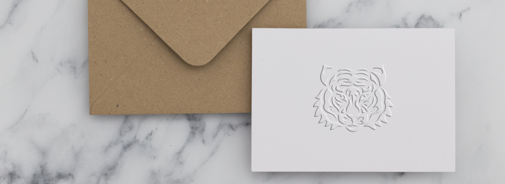 Photoshop: How to Create the Look of an Embossed Logo on Paper. 